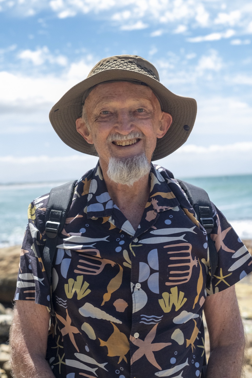 Charles Griffiths on the rocky shore